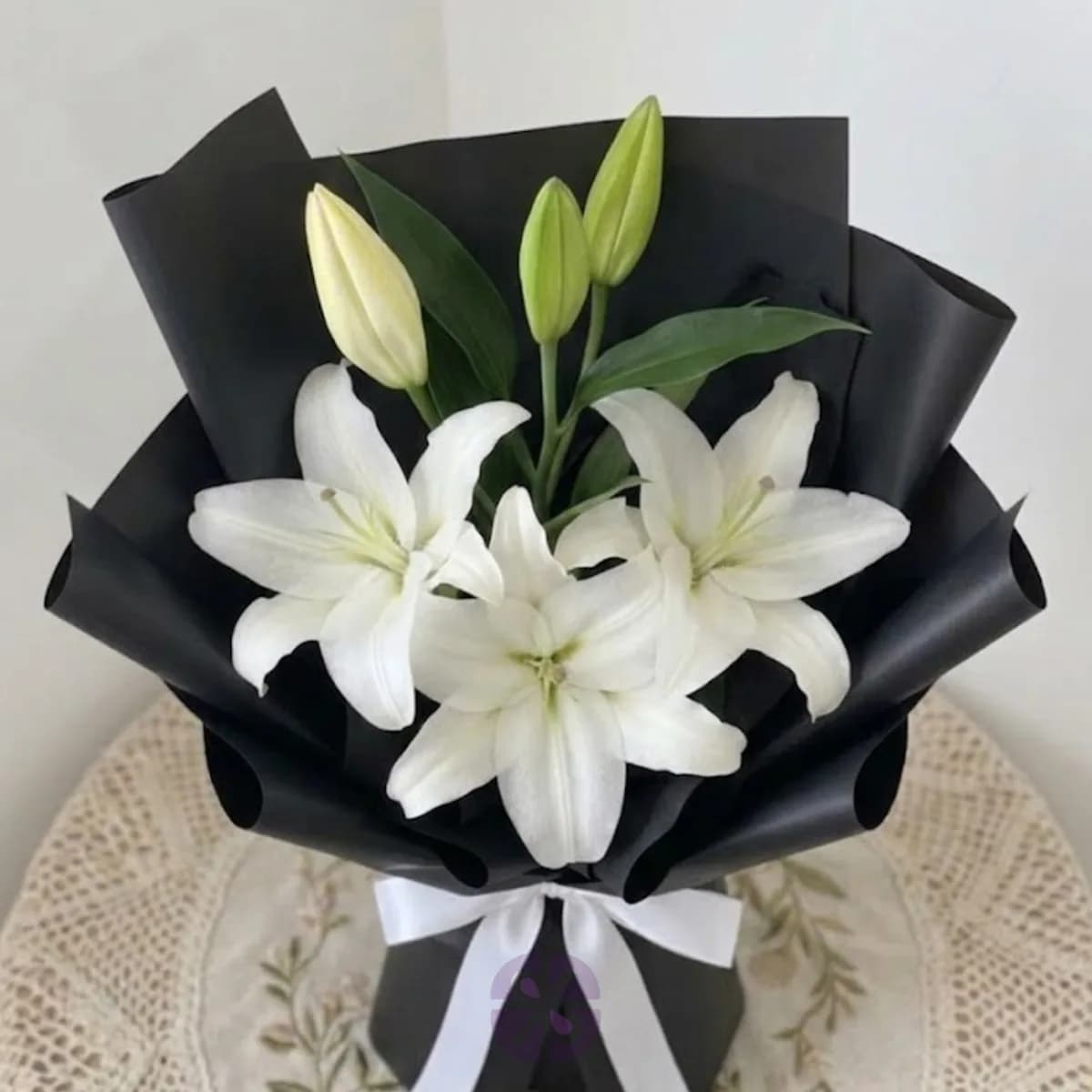Premium White Oriental Lily Hand Bouquet in  Black Wrap