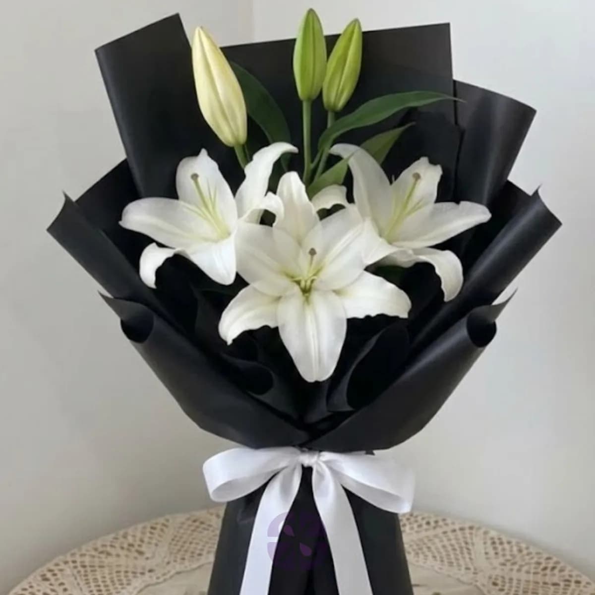 Premium White Oriental Lily Hand Bouquet in  Black Wrap