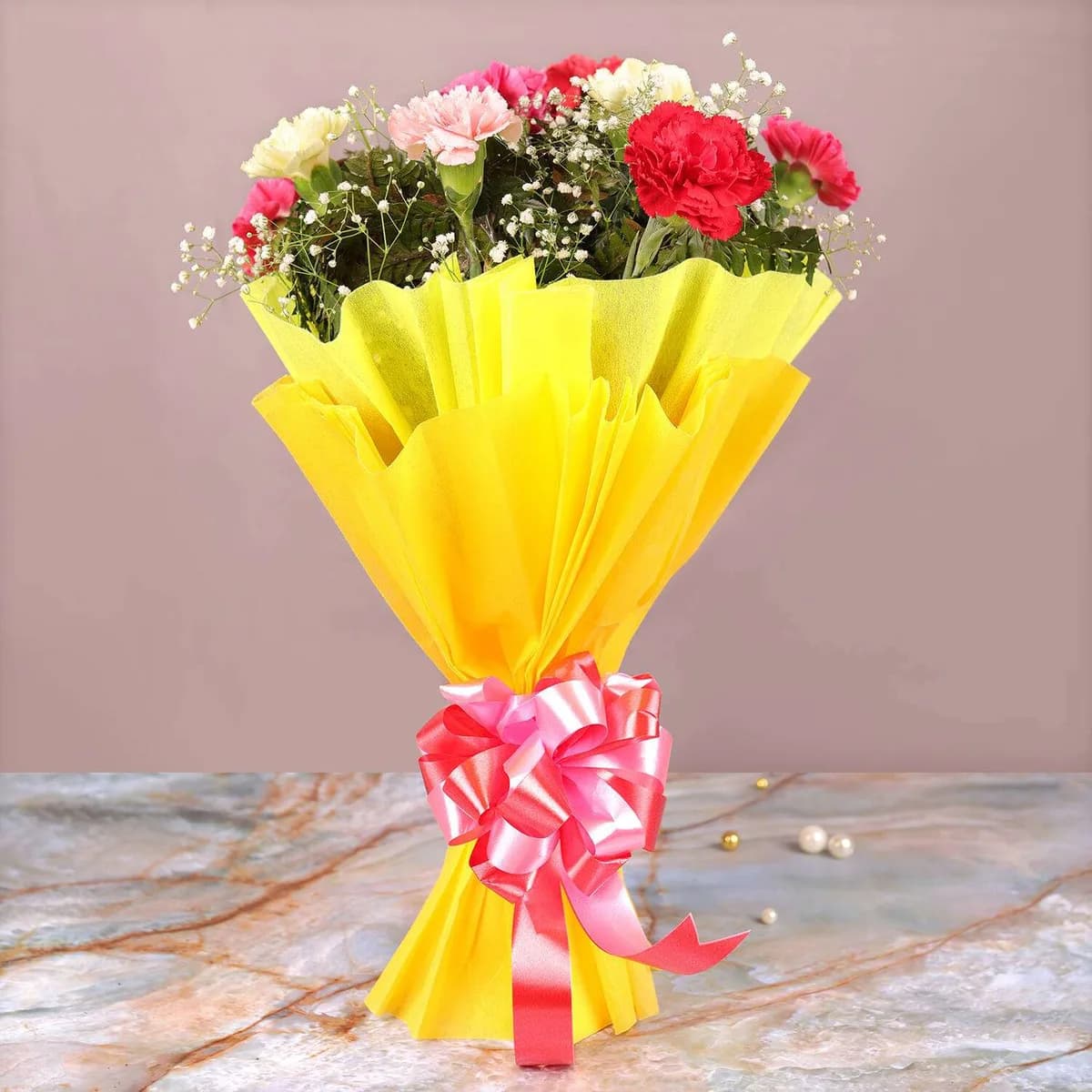 Vibrant Carnation Flower Bouquet – Mixed Colors with Yellow Wrapping & Pink Ribbon