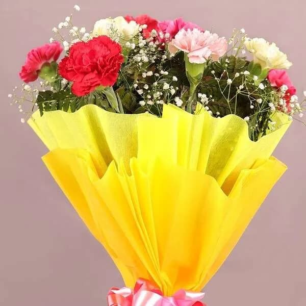 Vibrant Carnation Flower Bouquet – Mixed Colors with Yellow Wrapping & Pink Ribbon