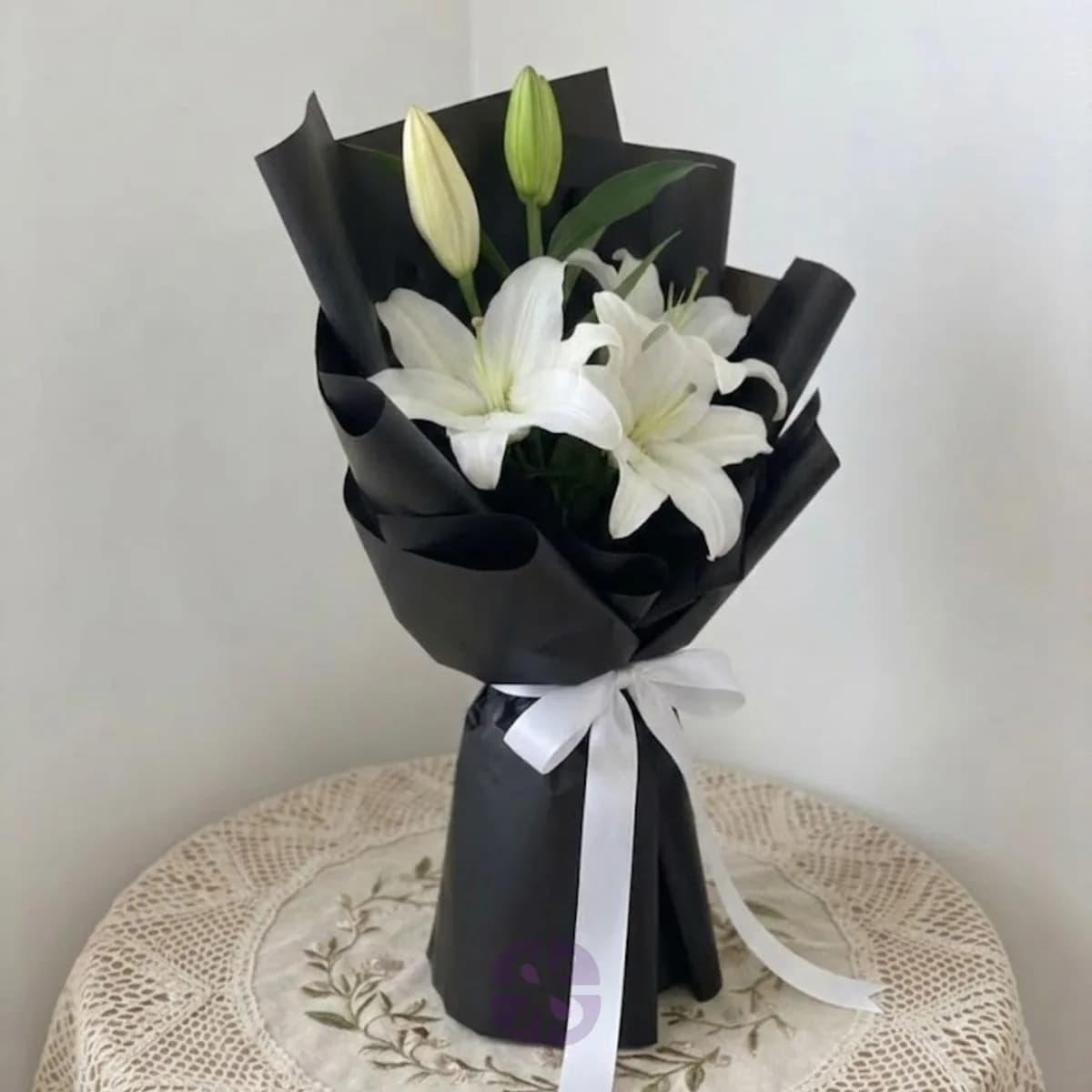 Premium White Oriental Lily Hand Bouquet in  Black Wrap