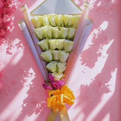 White Rose Cone Bouquet with Golden Bow & Touch of Pink