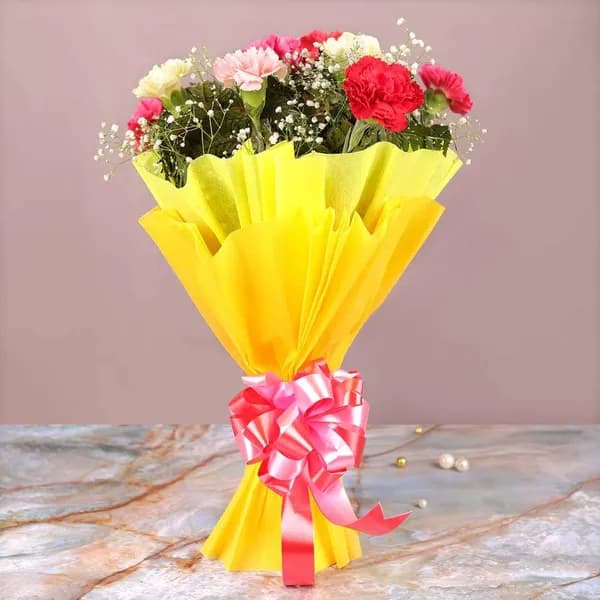 Vibrant Carnation Flower Bouquet – Mixed Colors with Yellow Wrapping & Pink Ribbon